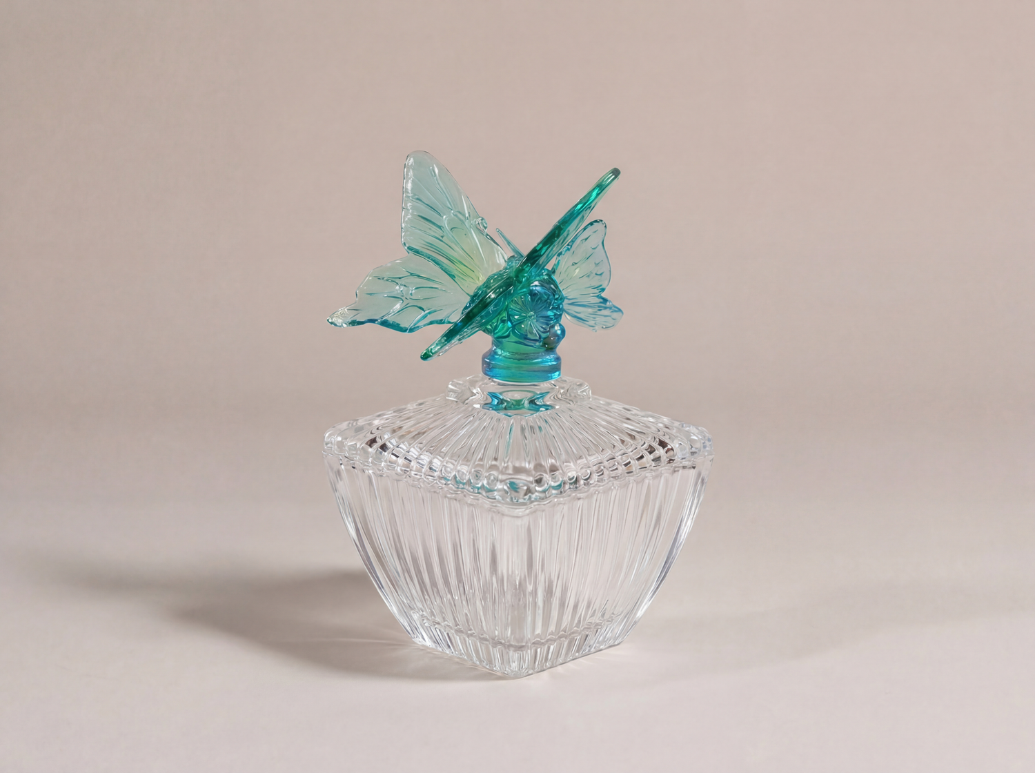 Fairuz – glass jar with aqua blue butterfly lid and textured crystal base فاخر من أتيليه كاروسيل