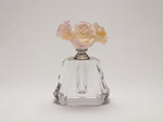 Hamsa – crystal oud bottle with handcrafted blush rose bouquet cap فاخر من أتيليه كاروسيل