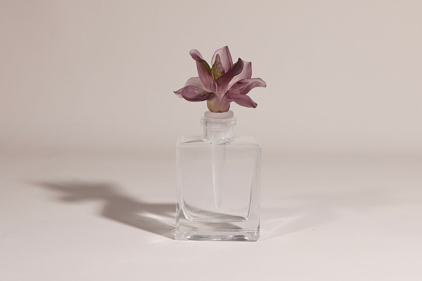 Lily luxury glass perfume bottle with handcrafted crystal lily flower by Atelier Carrousel