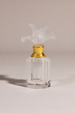 Loulwa luxury crystal oud bottle with frosted bloom and golden neck on octagonal base by Atelier Carrousel